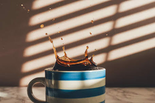 coffee splashing on table